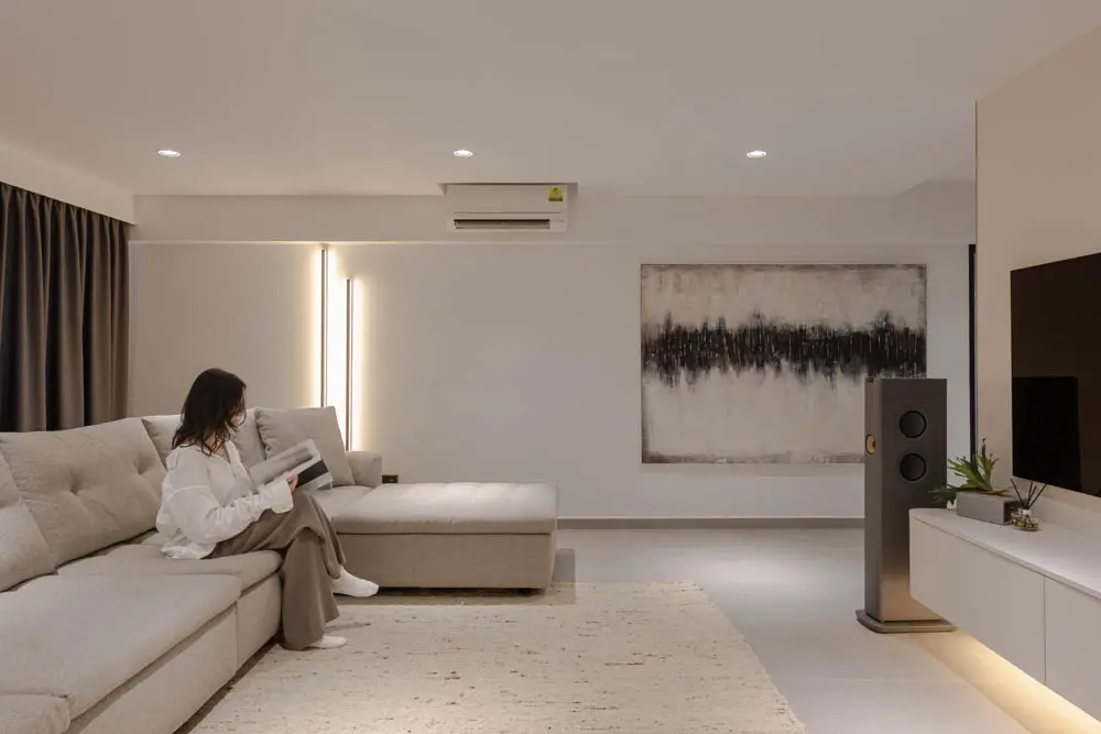 Living room with layered lighting and curated art
